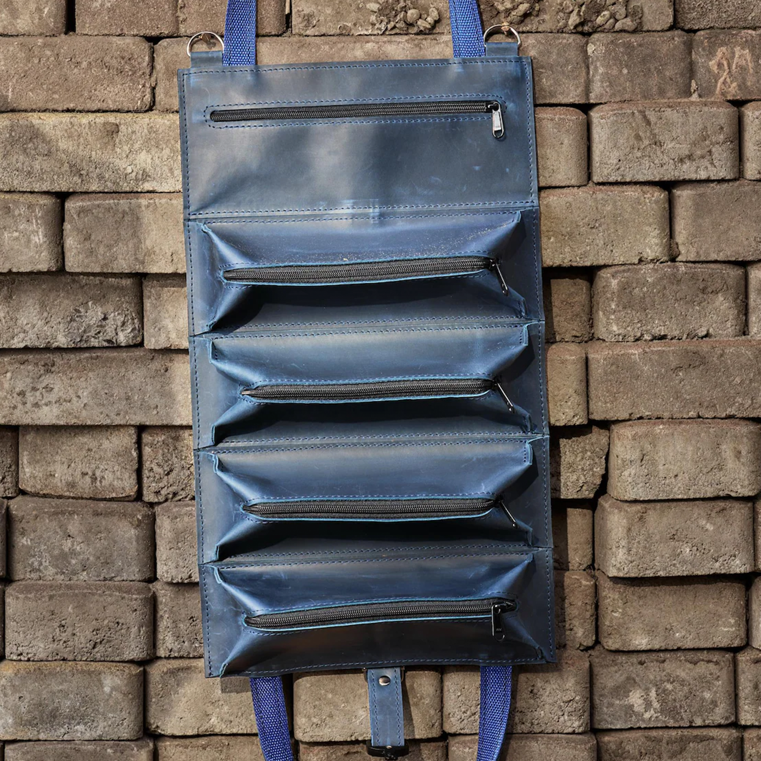 Vertical Roll-Up Tool Organizer With Five Stacked Zippered Pockets, Woven Fabric Hanging Loops And Wall Mount Eyelet Fixtures