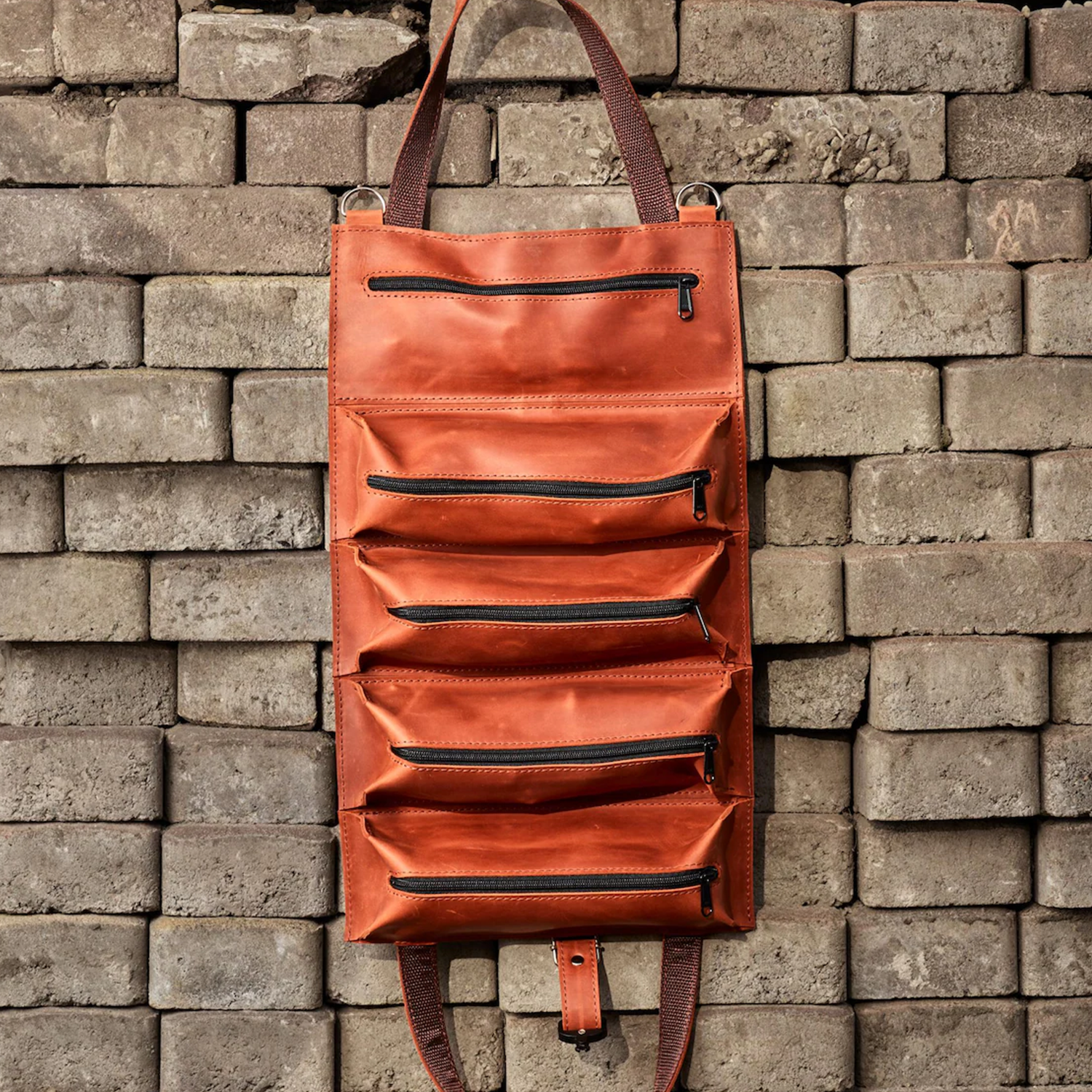 Vertical Roll-Up Tool Organizer With Five Stacked Zippered Pockets, Woven Fabric Hanging Loops And Wall Mount Eyelet Fixtures