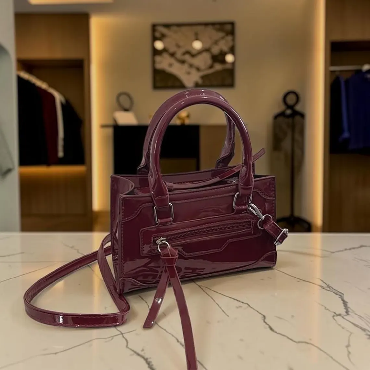 Triple Gloss Tone Compact Rectangular Mini Handbag With Curved Top Grip Loops, Recessed Front Zip Pocket And Thin Decorative Tassel Tab
